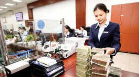 Ngân hàng lợi nhuận nhiều, nợ xấu tăng