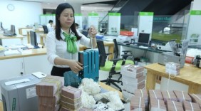 Chính phủ vay xong, lãi suất tín phiếu xuống kỷ lục