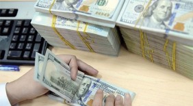 Tiếp tục nhập siêu, tỷ giá USD/VND giữ mức cao